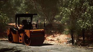 road roller tractor in the forest video