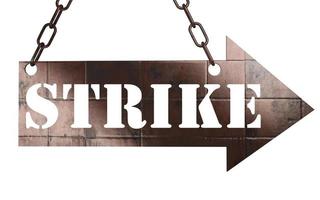 strike word on metal pointer photo