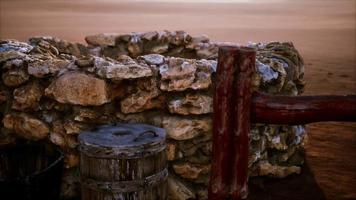 old stone water well in the desert video