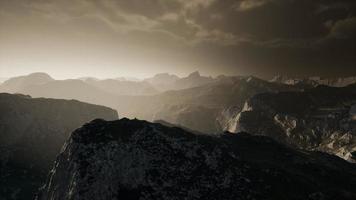 Dramatic sky over steps in a mountain. video