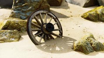 old tradition waggon wheel on the sand video