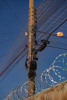 pole with wires and electrical devices photo