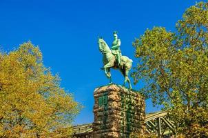 Equestrian Statue of Kaiser Wilhelm II monument on stone pedestal near Hohenzollern bridge photo