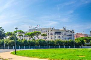 Rimini, Italy Grand Hotel and square with green lawn in touristic city centre photo