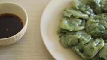 steamed chives dumplings with sauce - Asian food style video