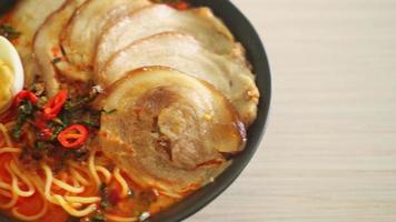 Ramen Noodles Spicy Tomyum Soup with Roast Pork - Fusion food style