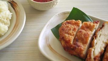 fried chicken with sticky rice and spicy sweet sauce video