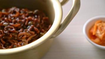 Korean black spaghetti or instant noodle with roasted chajung soybean sauce or chapagetti - Korean food style video