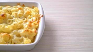 mac and cheese, macaroni pasta in cheesy sauce - American style video