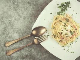 Italian pasta with carbonara sauce photo