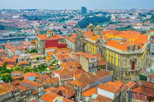 Aerial panoramic view of Porto Oporto city historical centre with red tiled roof typical buildings photo
