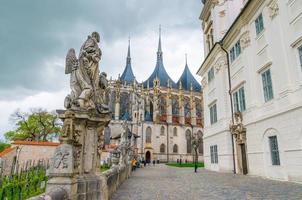 Saint Barbara's Cathedral Roman Catholic church Gothic style building and baroque statues photo