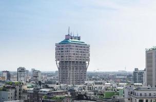 Torre Velasca tower modern skyscraper in Milan city centre, Italy photo