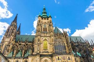 Golden Gate South Tower with clock - exterior of St. Vitus Cathedral photo