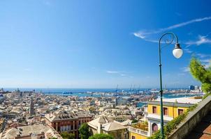 Top aerial scenic panoramic view from above of old historical centre quarter districts of european city Genoa photo