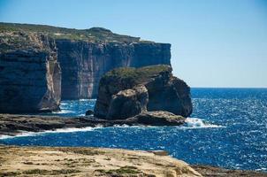 Fungus and Gebla Rock cliffs near Azure window, Gozo island, Malta photo