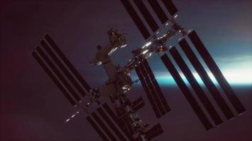 International Space Station over the planet Elements furnished by NASA video