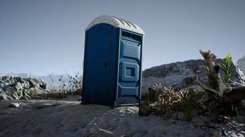 Portable mobile toilet in the beach. chemical WC cabin