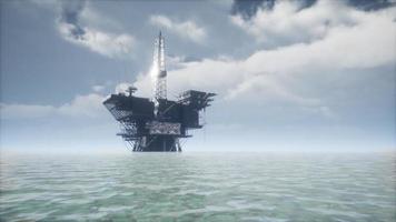 Large Pacific Ocean offshore oil rig drilling platform video