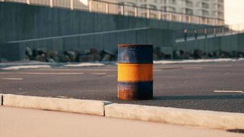 old and rusty metal barrel on parking video