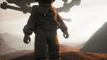 Astronaut walking on an Mars planet