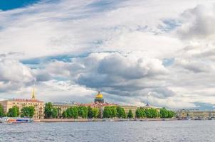 Cityscape of Saint Petersburg Leningrad city with row of old buildings on embankment of Neva river photo