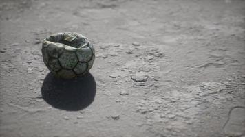 Old soccer ball the cement floor video