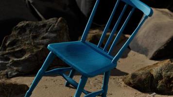 retro blue wooden chair on the beach video