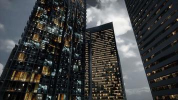 Glass Skyscrpaer Office Buildings with dark sky video