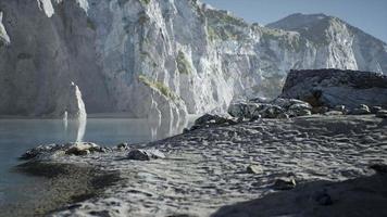 Sand beach among rocks at Atlantic Ocean coast in Portugal video