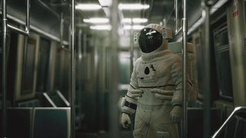 Astronaut Inside of the old non-modernized subway car in USA
