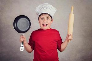 niño cocinero enojado foto