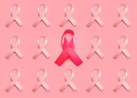 concepto de cáncer de mama patrón geométrico hecho con cintas rosas foto