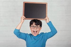 happy child with a blackboard photo