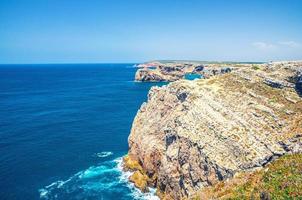 Rocks and cliffs of Atlantic Ocean near Cape Saint Vincent Cabo de Sao Vicente southwesternmost point of mainland Europe photo