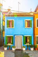 Burano island with colorful houses buildings photo