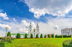 Holy Spirit Cathedral Orthodox Church Baroque style building and green grass lawn in Upper Town Minsk photo