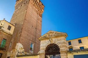 Porta Castello Tower Torre and Gate Terrazza Torrione brick building in old historical city photo