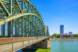 The Hohenzollern Bridge or Hohenzollernbrucke across Rhine river photo