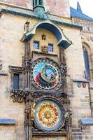 Prague Astronomical Clock Orloj with small figures located at the medieval Old Town photo