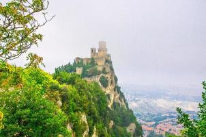 Republic San Marino Prima Torre Guaita first fortress tower with brick walls on Mount Titano stone rock photo