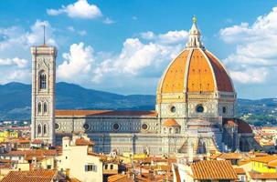 Top aerial panoramic view of Florence city with Duomo Cattedrale di Santa Maria del Fiore cathedral photo