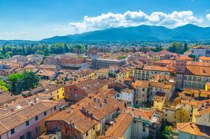 Aerial top panoramic view of historical centre medieval town Lucca with old buildings photo