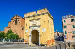 Porta Santa Maria o Porta Garibaldi gate and Cathedral Santa Maria Assunta Duomo catholic church in Chioggia photo