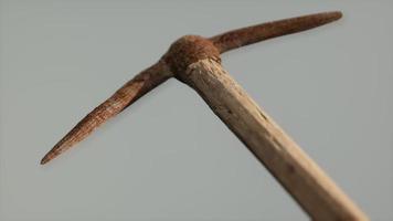 Close up of an old rusted pickaxe head