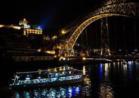 Portugal, night Porto, lights of night city, night panoramic view of The Eiffel Bridge, Ponte Dom Luis, Bridge Ponti Di Don Luis photo