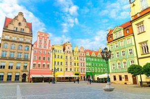 Row of colorful traditional buildings with multicolored facades photo