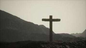 wooden Crucifix cross at mountain video