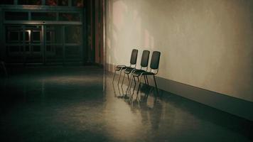 empty corridor in hospital with chairs