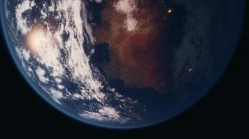 planeta terra visto do espaço à noite mostrando as luzes dos países